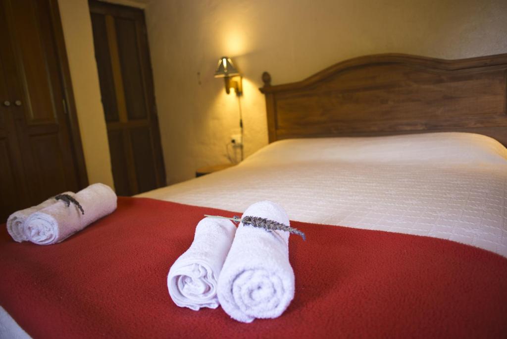 Postel nebo postele na pokoji v ubytování Casa Rural Los Patos