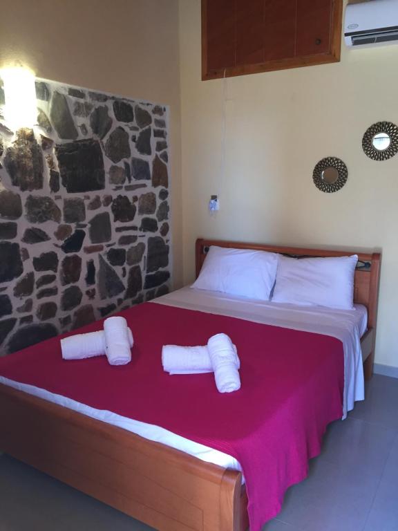 Katil atau katil-katil dalam bilik di Villa Makri