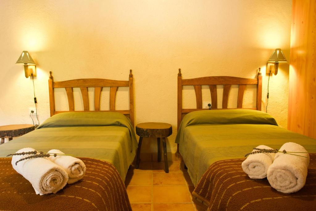 Postel nebo postele na pokoji v ubytování Casa Rural Los Patos