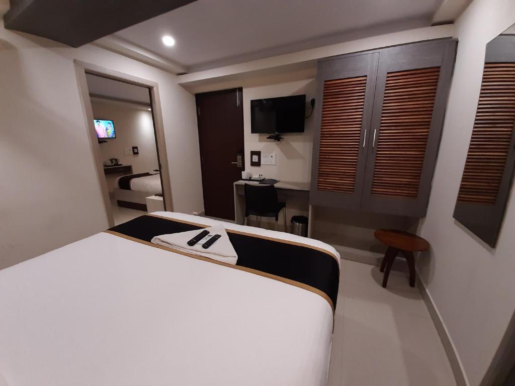 TV a/nebo společenská místnost v ubytování Liza Regency