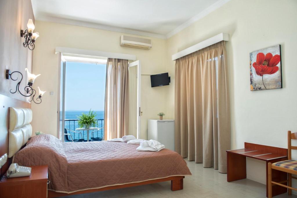 Postel nebo postele na pokoji v ubytování Hotel Solon