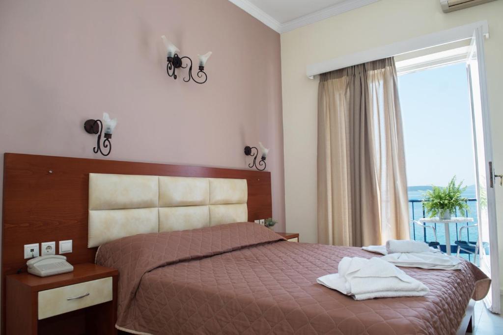 Postel nebo postele na pokoji v ubytování Hotel Solon