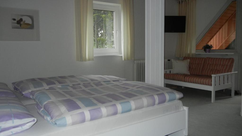 Postel nebo postele na pokoji v ubytování Hotel Barbara