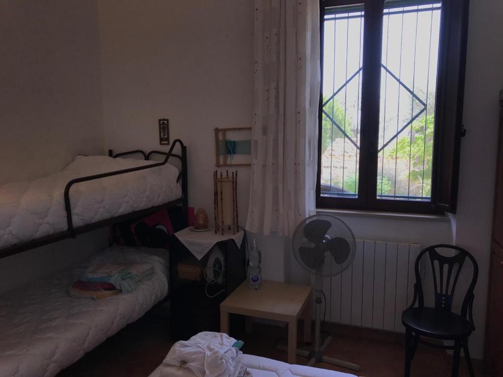 Postel nebo postele na pokoji v ubytování Casa delle Fate