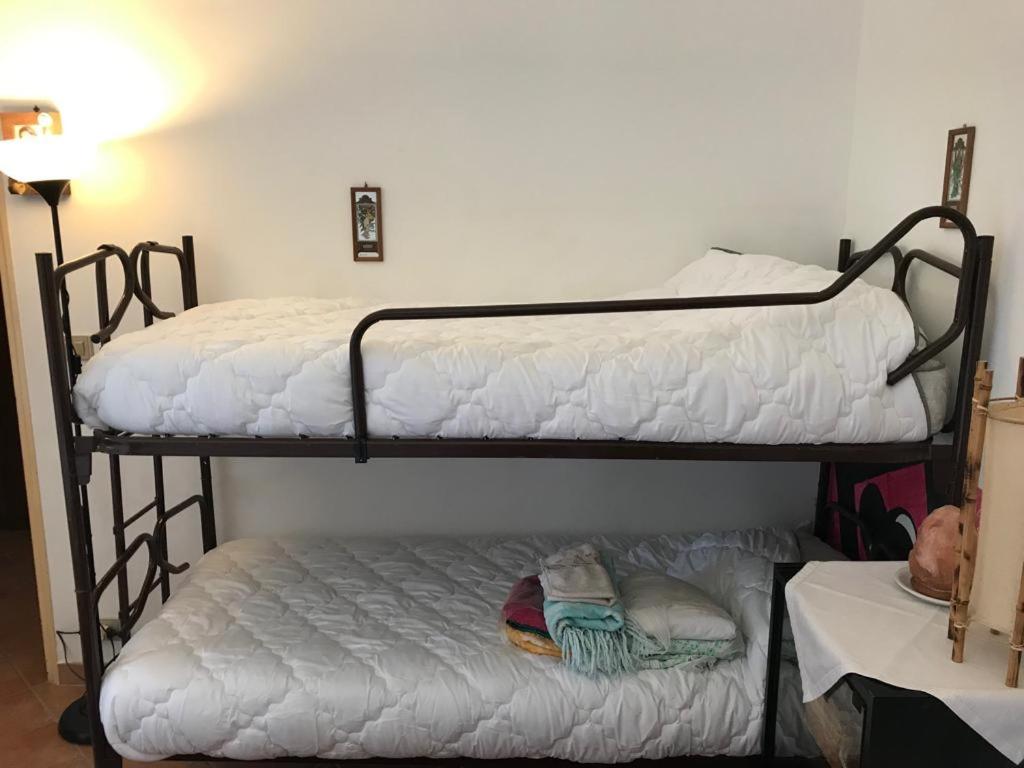 Postel nebo postele na pokoji v ubytování Casa delle Fate