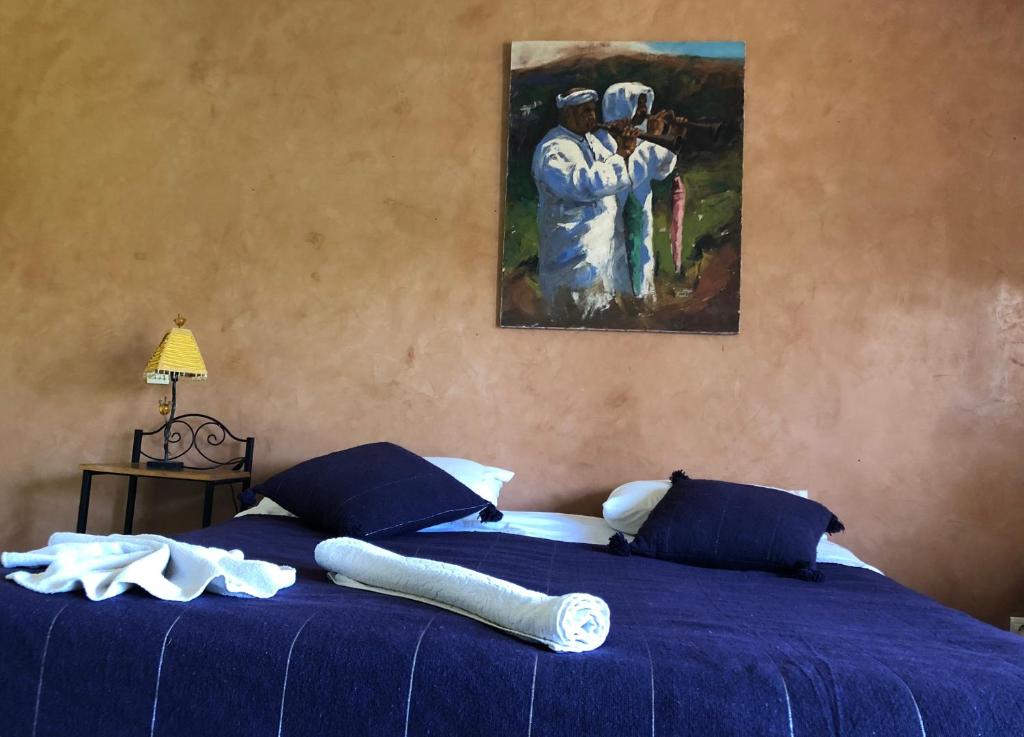 Postel nebo postele na pokoji v ubytování Riad Hamdani