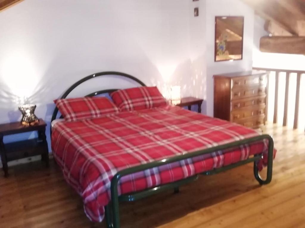Postel nebo postele na pokoji v ubytování Maison Cenne Vda Gressan n 0030