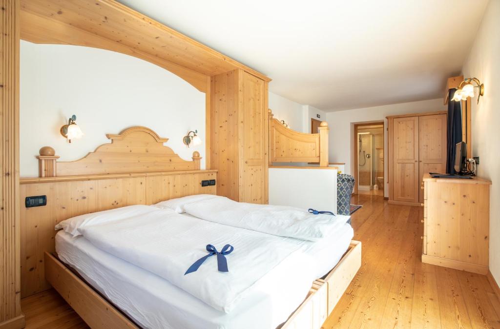 Postel nebo postele na pokoji v ubytování Hotel Siror