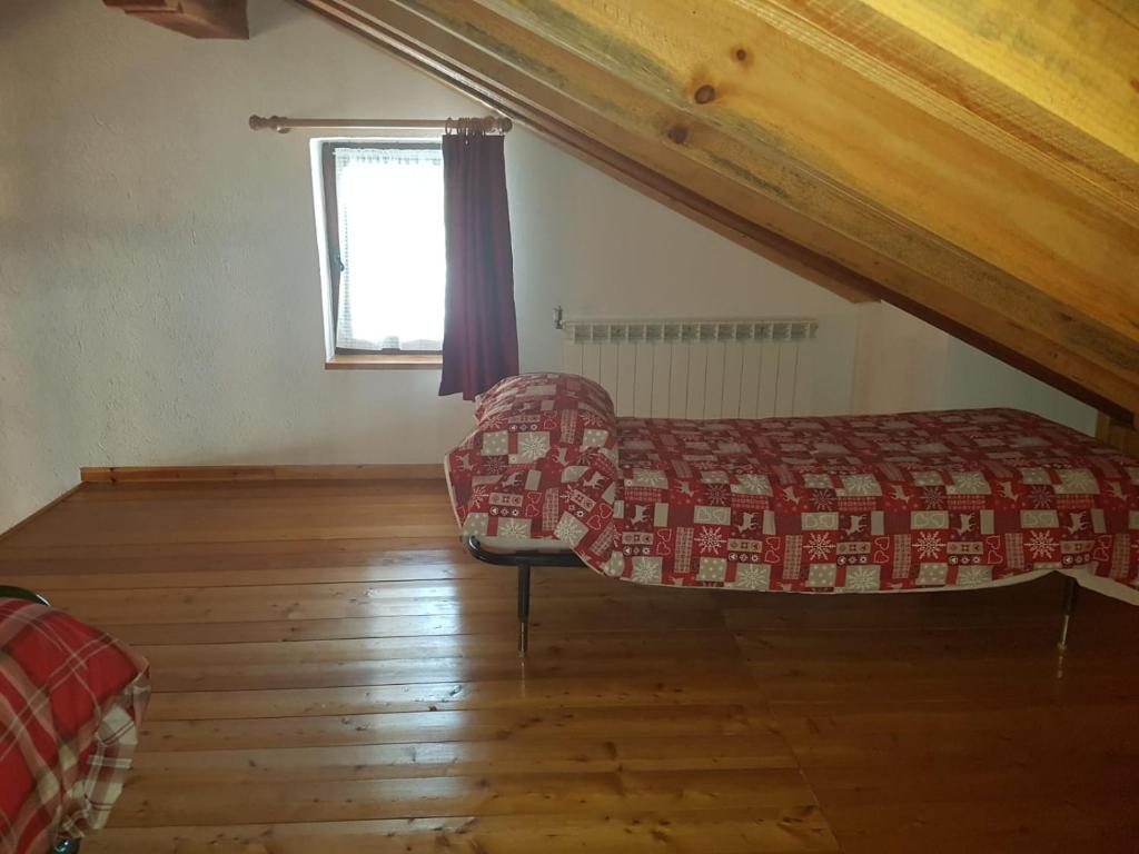 Postel nebo postele na pokoji v ubytování Maison Cenne Vda Gressan n 0030