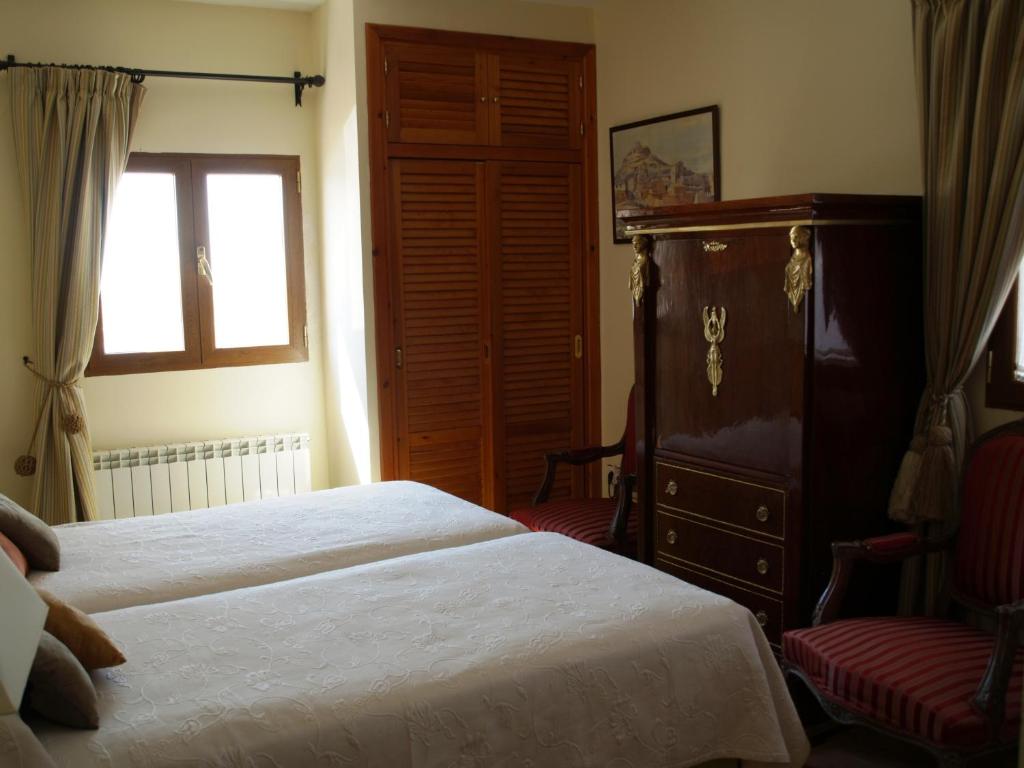 Cama o camas de una habitación en Residencia Real del Castillo de Curiel