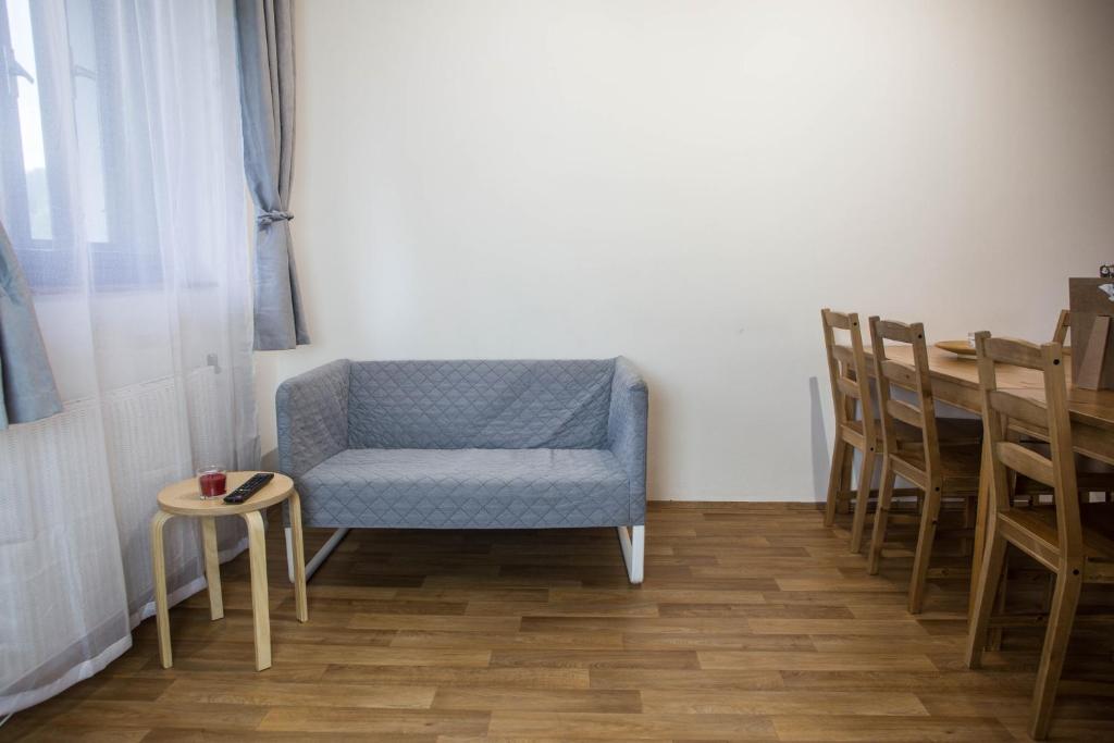 Posezení v ubytování Apartmány Ve Mlejně