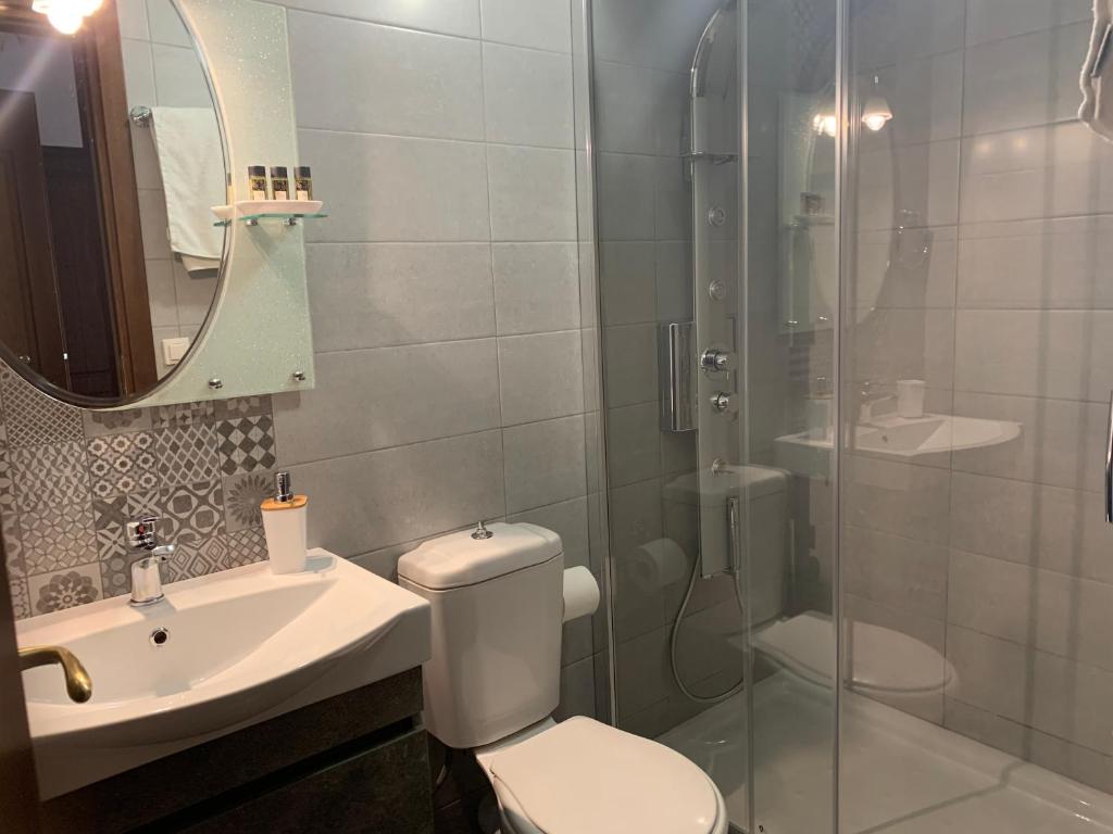 Koupelna v ubytování Iliovolo Guesthouse