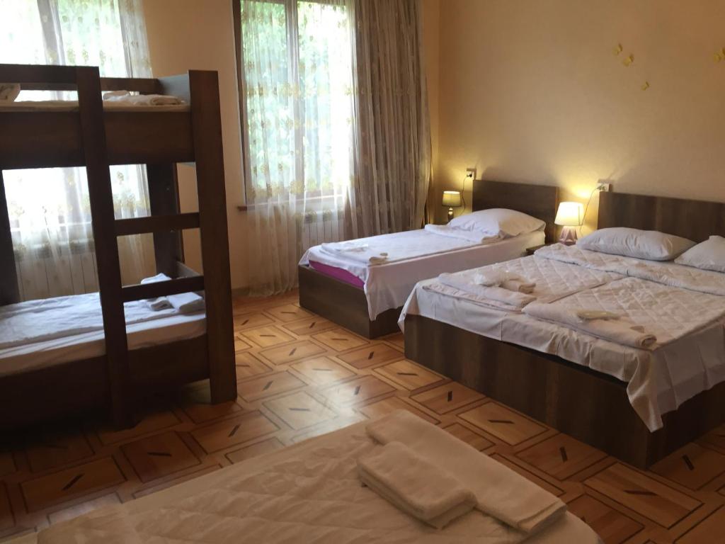 Postel nebo postele na pokoji v ubytování Hotel Good Luck