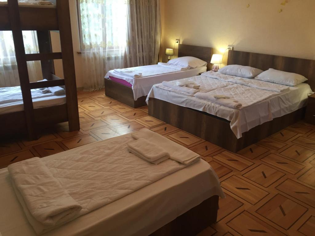 Postel nebo postele na pokoji v ubytování Hotel Good Luck