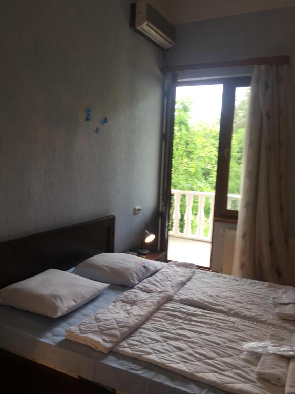 Postel nebo postele na pokoji v ubytování Hotel Good Luck
