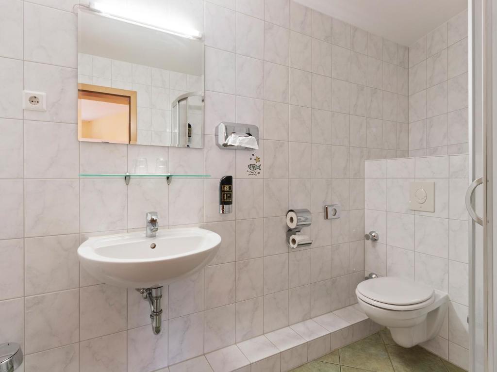 Koupelna v ubytování Hotel Bohemia