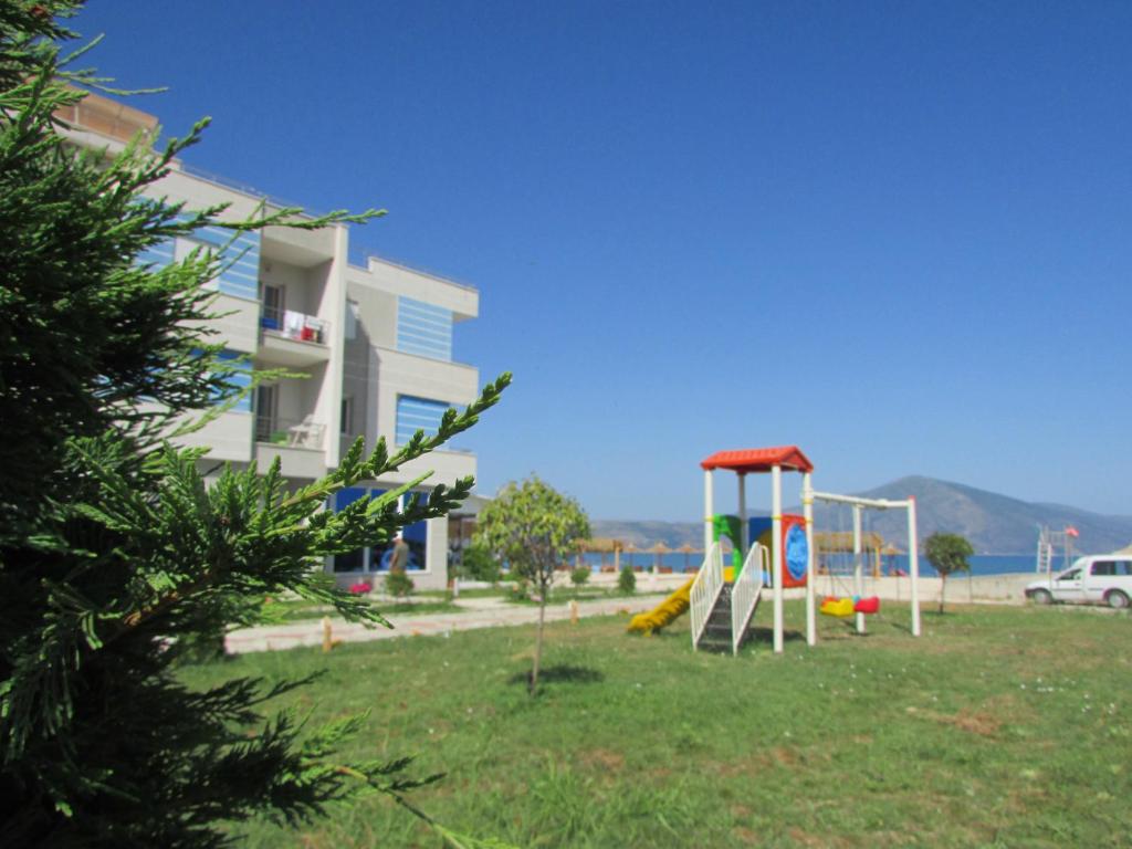 a playground with a slide at Blue Paradise Hotel in Orikum