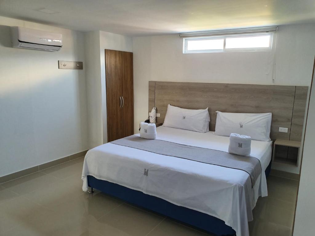 Cama o camas de una habitación en HOTEL A1 EXPRESS