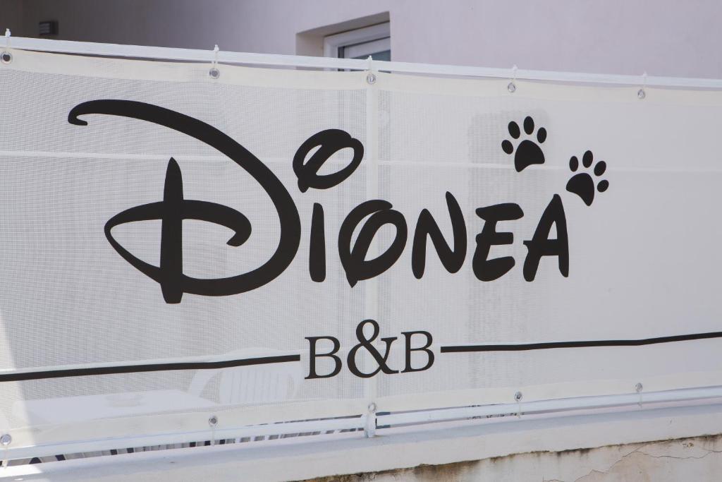 a sign for a bbq restaurant at B&B Dionea in Santa Maria di Castellabate