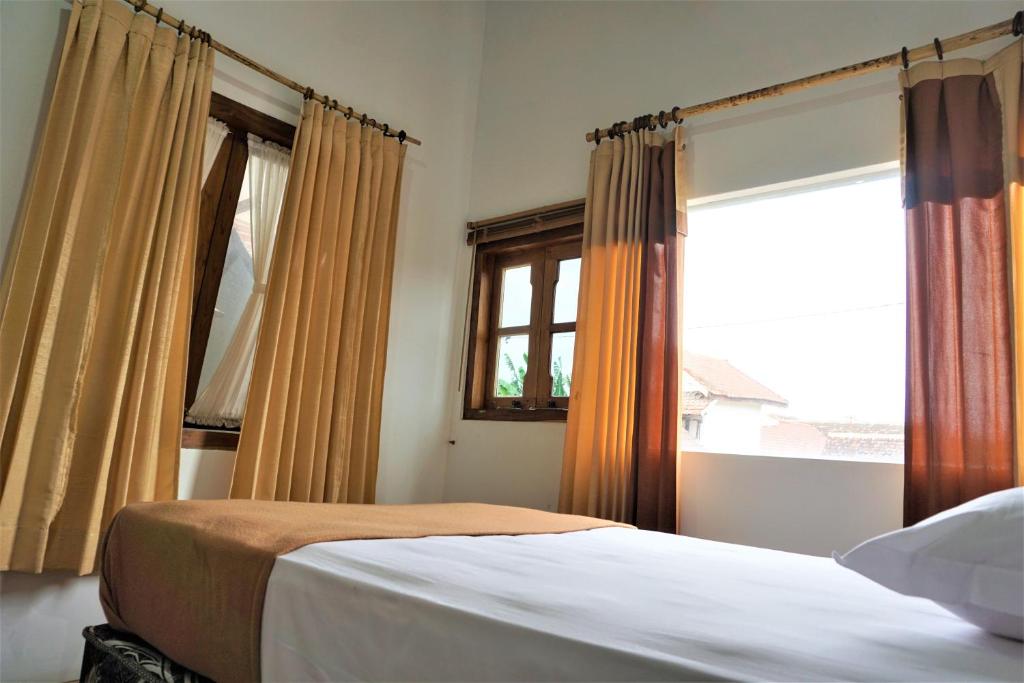 Postel nebo postele na pokoji v ubytování BRB Guesthouse