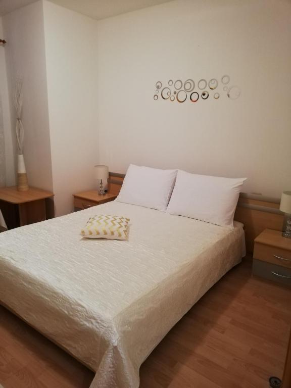 Postel nebo postele na pokoji v ubytování Apartman Doli