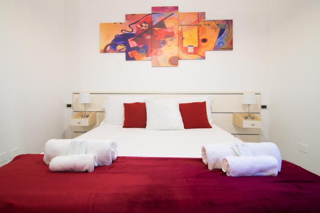 Ένα ή περισσότερα κρεβάτια σε δωμάτιο στο 8- Tourist House Bologna - Light House - Self check-in