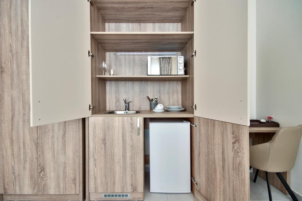Kuchyň nebo kuchyňský kout v ubytování The Suites – Piazza Kirkop