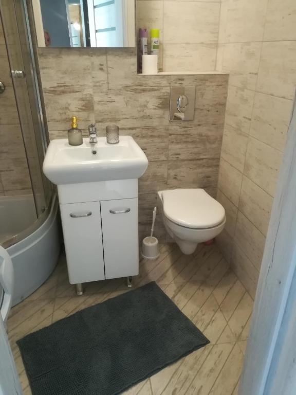 Ванна кімната в Apartament Centrum Chmielna