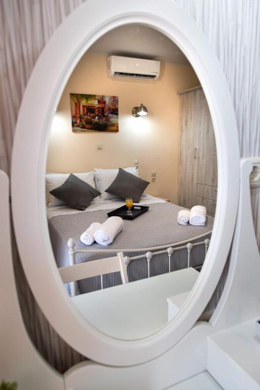 Łóżko lub łóżka w pokoju w obiekcie Ifi Sea House