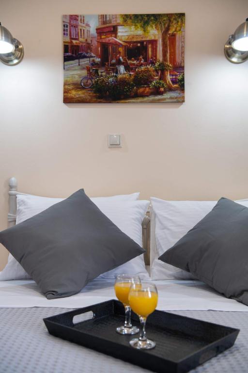 Łóżko lub łóżka w pokoju w obiekcie Ifi Sea House