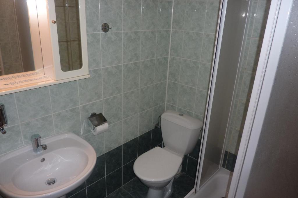 Koupelna v ubytování Hotel Uno