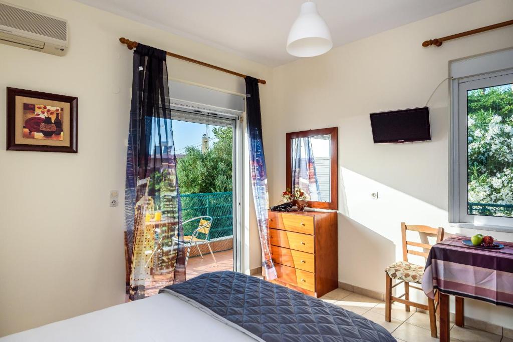 Postel nebo postele na pokoji v ubytování Golden Beach Hill Apartments