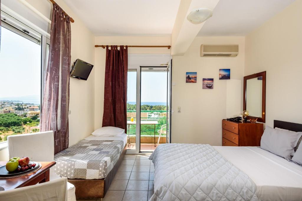 Postel nebo postele na pokoji v ubytování Golden Beach Hill Apartments