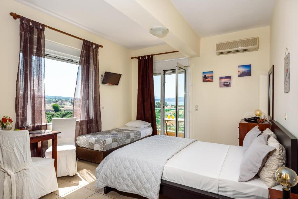 Postel nebo postele na pokoji v ubytování Golden Beach Hill Apartments