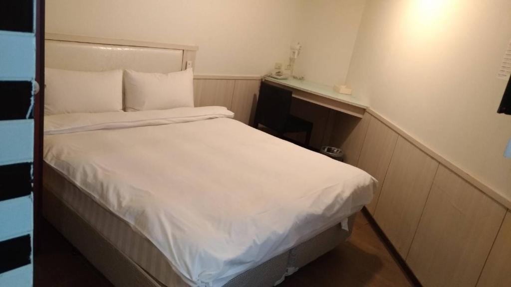 Postel nebo postele na pokoji v ubytování Galaxy Mini Inn