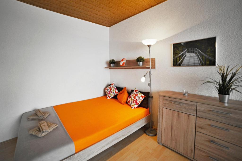 Postel nebo postele na pokoji v ubytování apartmány 2+1 u Klínovce