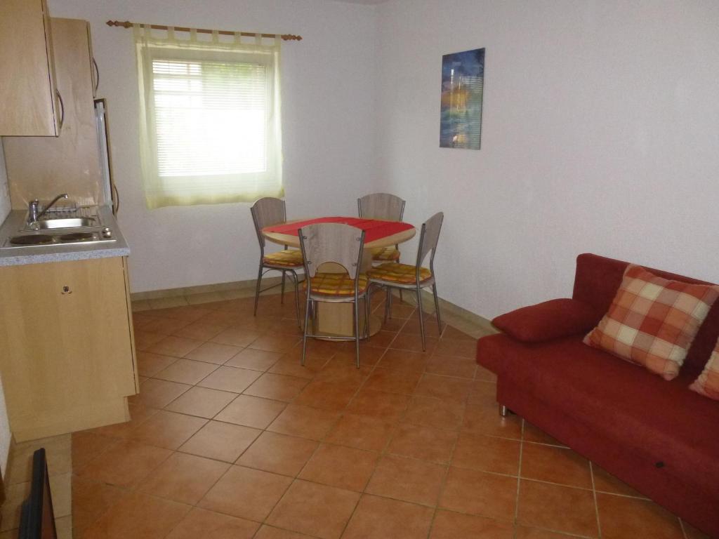 Kuchyň nebo kuchyňský kout v ubytování Apartments Villa Rosmarin