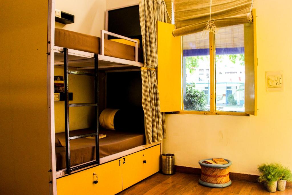 Postel nebo postele na pokoji v ubytování The Hostel Air Pushkar