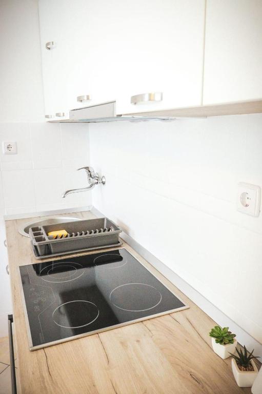 Kuchyň nebo kuchyňský kout v ubytování Apartment Dream of Split