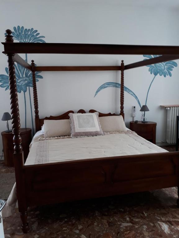 Postel nebo postele na pokoji v ubytování Casa Sulla Laguna