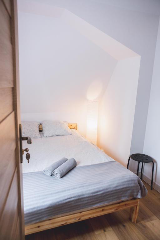 Postel nebo postele na pokoji v ubytování Hostel 55 - darmowy parking