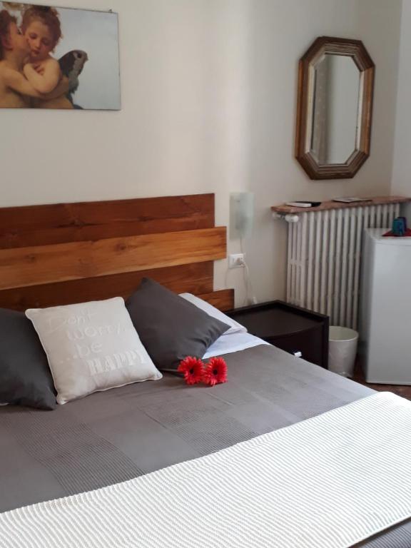 Postel nebo postele na pokoji v ubytování Casa Sulla Laguna
