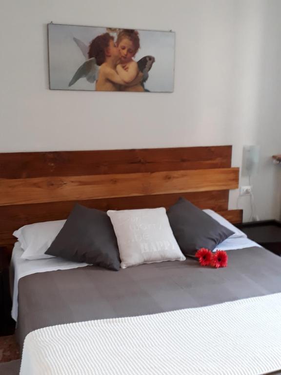 Postel nebo postele na pokoji v ubytování Casa Sulla Laguna