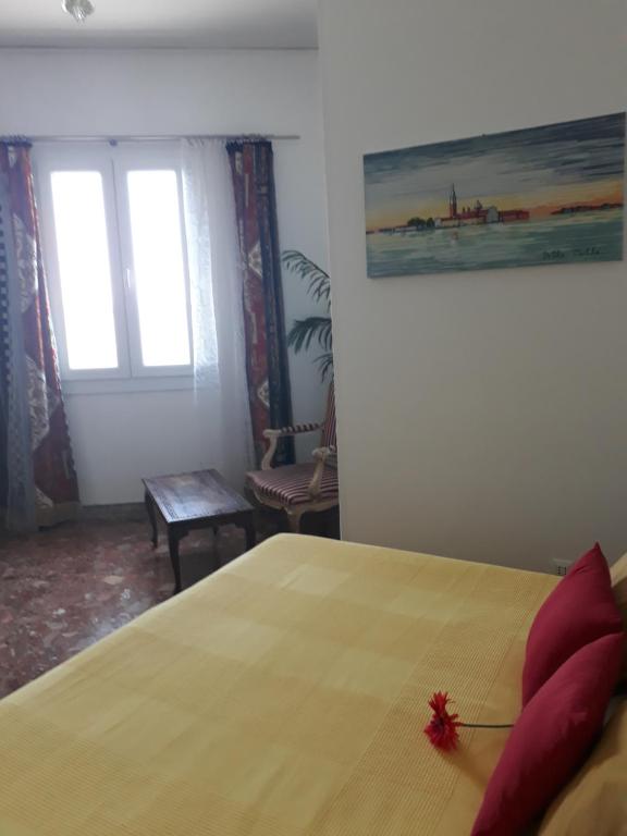 Postel nebo postele na pokoji v ubytování Casa Sulla Laguna