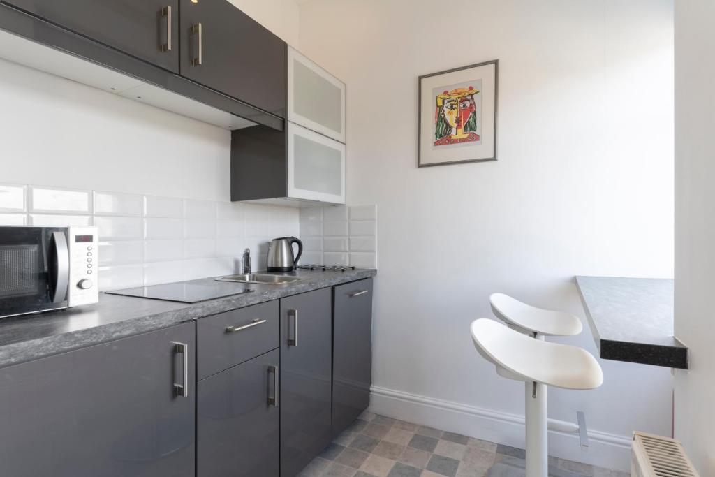 Kuchyň nebo kuchyňský kout v ubytování Barnes Fell Apartments