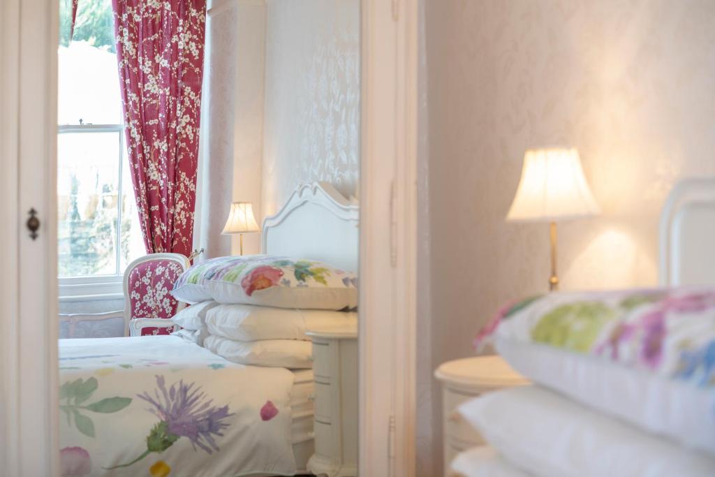 Postel nebo postele na pokoji v ubytování Barnes Fell Apartments