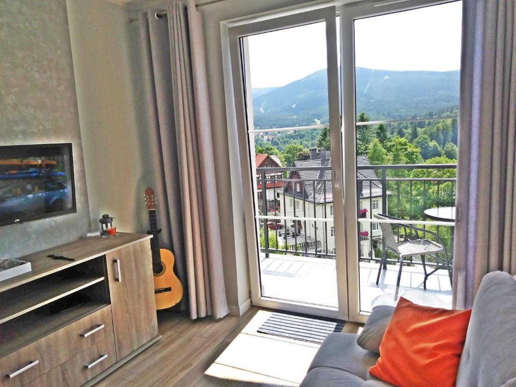 Nespecifikovaný výhled na hory nebo výhled na hory při pohledu z apartmánu