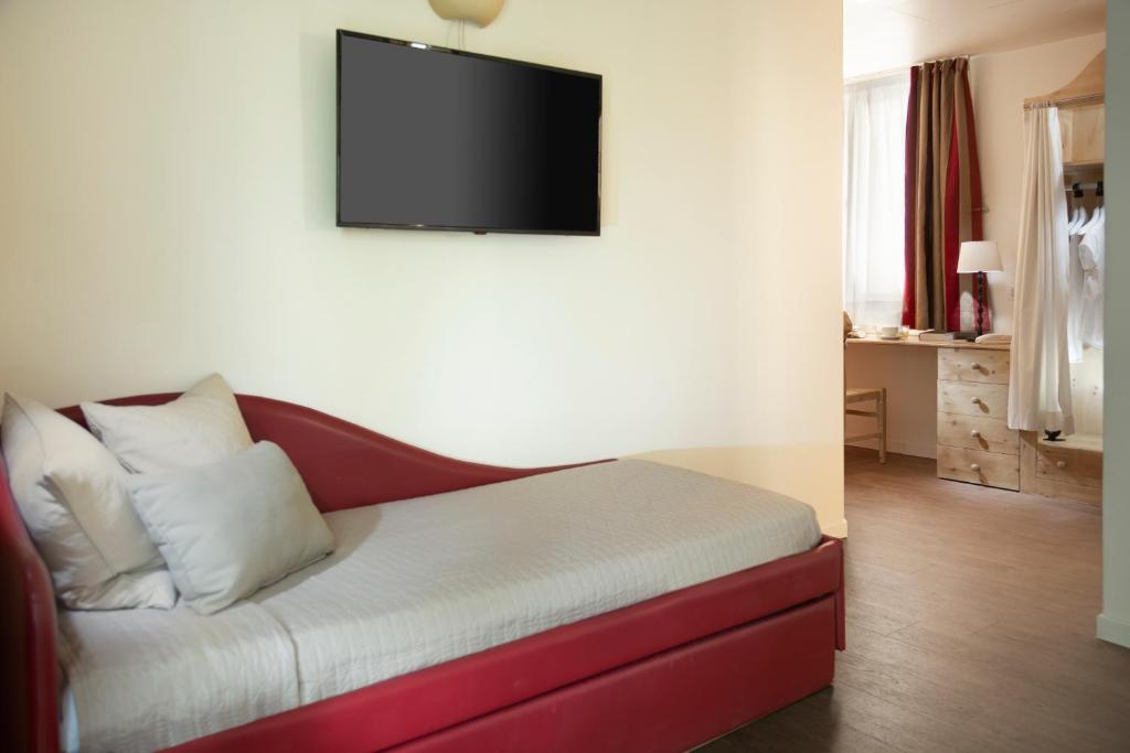 TV a/nebo společenská místnost v ubytování Hotel LaMorosa