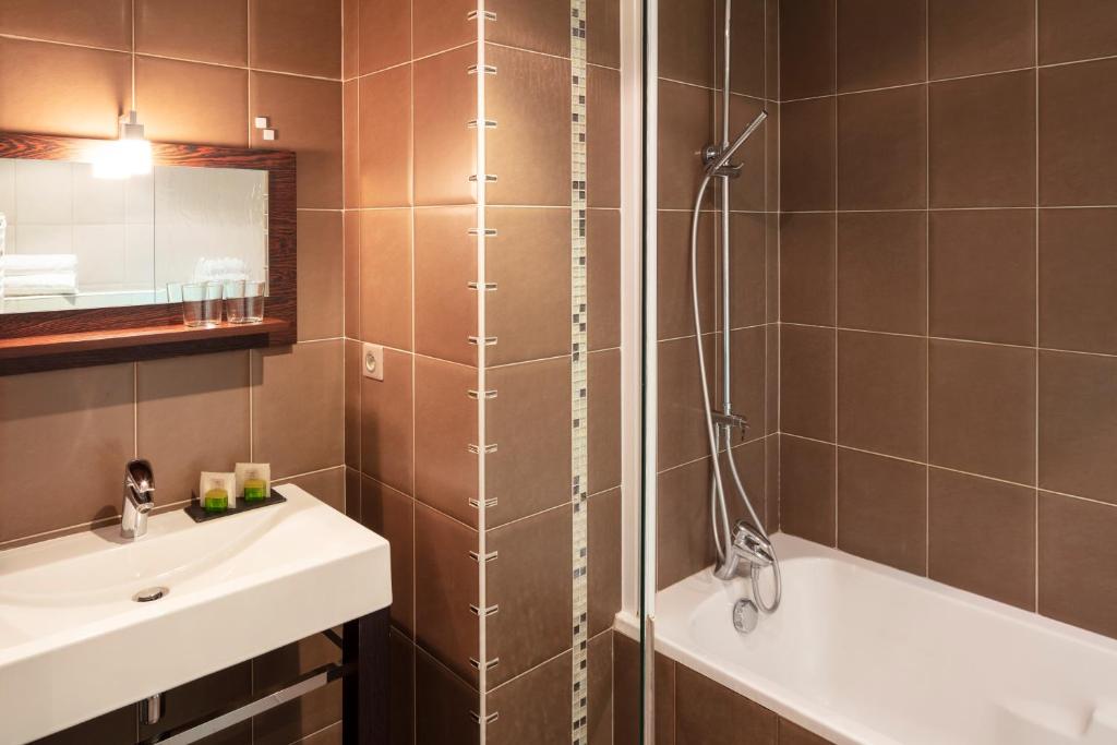 Koupelna v ubytování Hotel La Chaumière