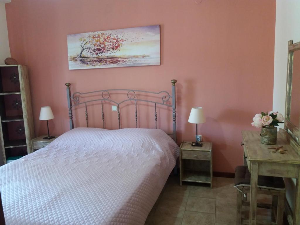 Postel nebo postele na pokoji v ubytování Alexandra Spingou Apartments